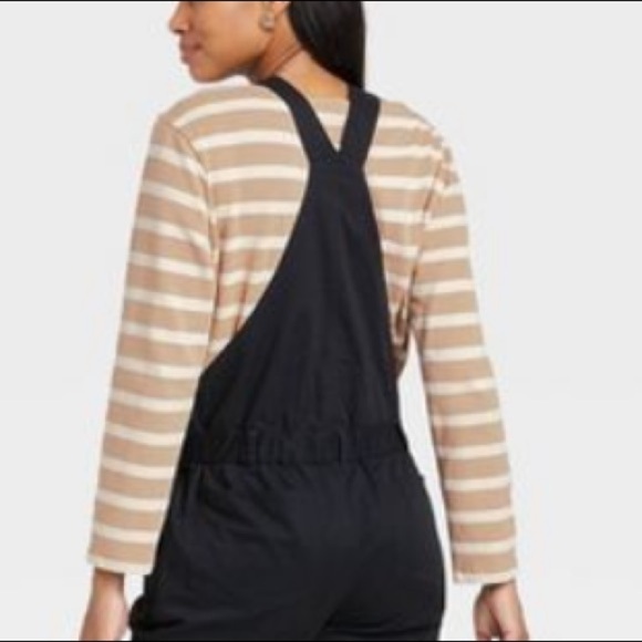 (8)- The Nines by HATCH™ Sleeveless Classic Cotton Twill Maternity Jumpsuit - Picture 3 of 11